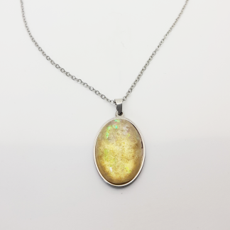 Golden Sparkle Pendant on a Stainless Steel Necklace